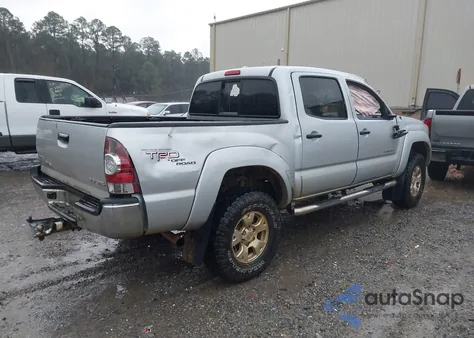 2009 Toyota Tacoma Base V6 z USA, uszkodzony, nr VIN 3TMLU42N09M027114